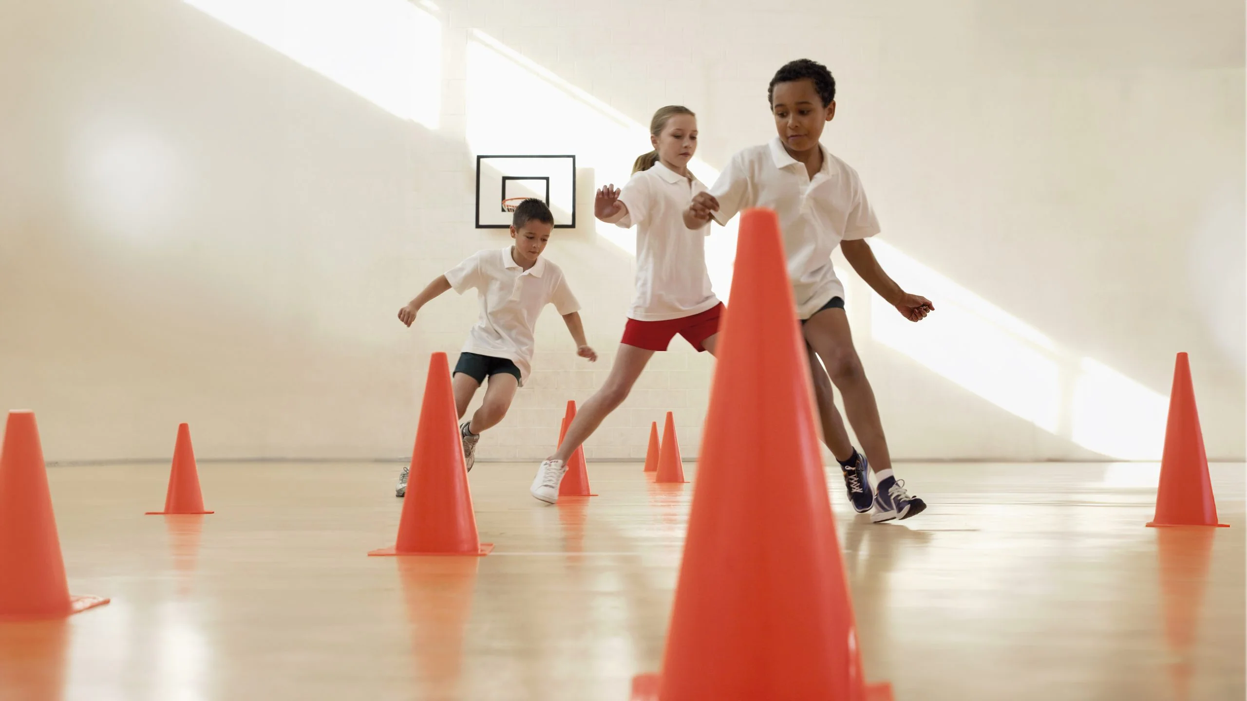 students at school doing a relay race