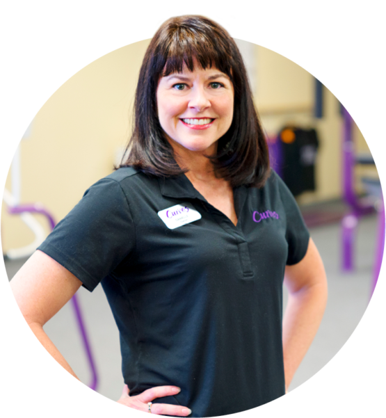 Curves employee smiling